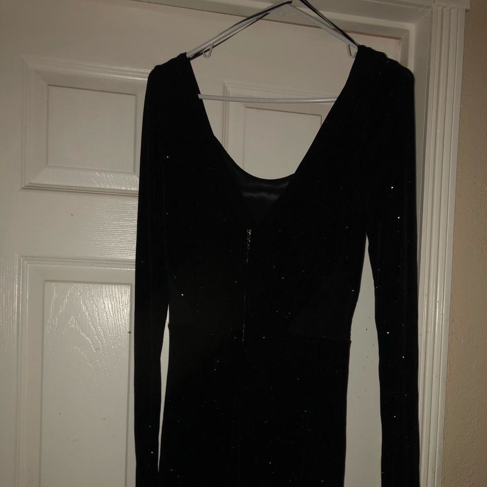 A guess dress it a black shiny dress